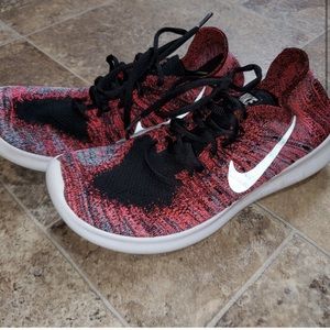 Women's Nike free flyknit size 7.5 pink blue